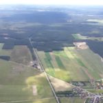 Thumbnail of http://Korne%20(EPKO)%20Airfield%20can%20be%20seen%20along%20characteristic%20triangular%20small%20forest