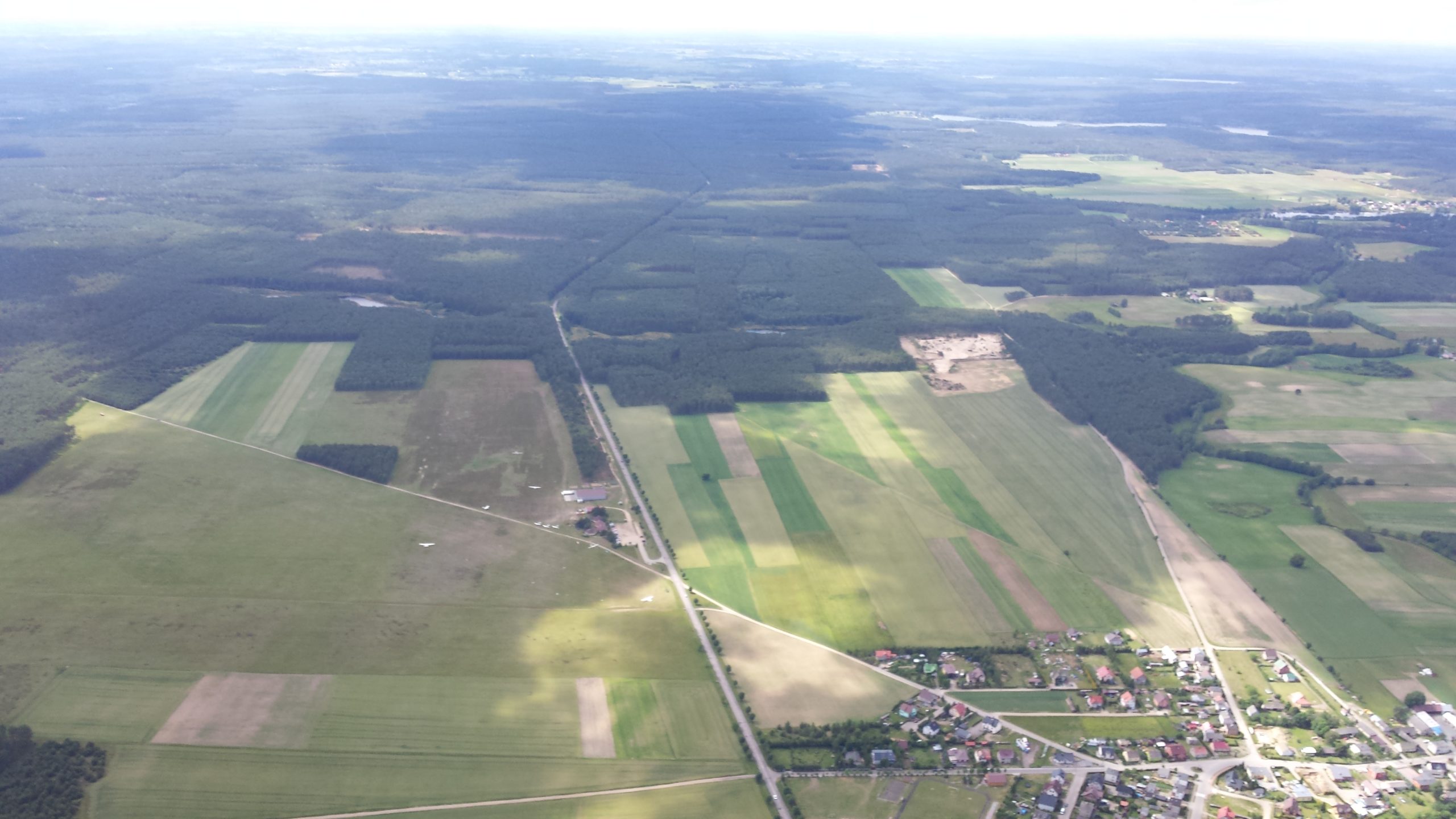 Korne (EPKO) Airfield can be seen along characteristic triangular small forest